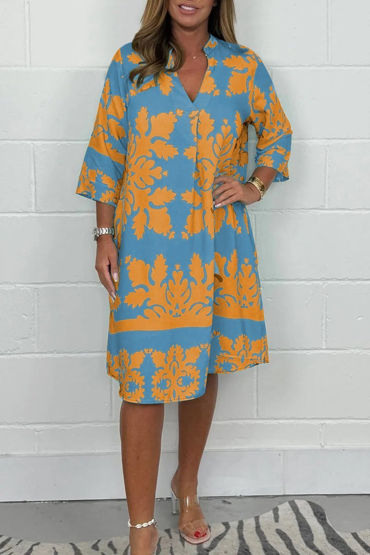 Robe Rayonnante En Col V